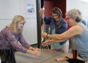 team working together to build marshmallow structure