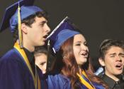 GARY ALLEN - The school's award-winning Vocal Point choir regaled those attending with a song.