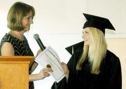 Two people, indoor graduation