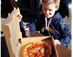 SUBMITTED - CVMS celebrated 16 students, including sixth grader Garrett Chaffee (above), and seven staff members for being 'kindness leaders' by hosting a make-your-own pizza event with the help of Red Hills Market's mobile pizza truck Jan. 5. The event was part of a parent-led 'Kindness Matters' campaign that began last spring.