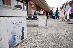 SETH GORDON - Staff, students, family and friends dedicated a plaque to longtime Dundee Elementary child development specialist Kevin Hall, who died suddenly prior to the start of the 2015-2016 school year, during a celebration of his birthday May 4. The plaque is mounted on a bench in the school's memorial garden, a project Hall helped oversee.